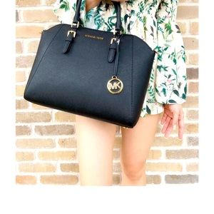 Selling the MK Ciara Satchel – a gently used, large saffiano satchel.